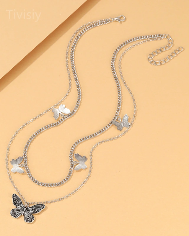 Multi Necklace With Butterfly In Silver